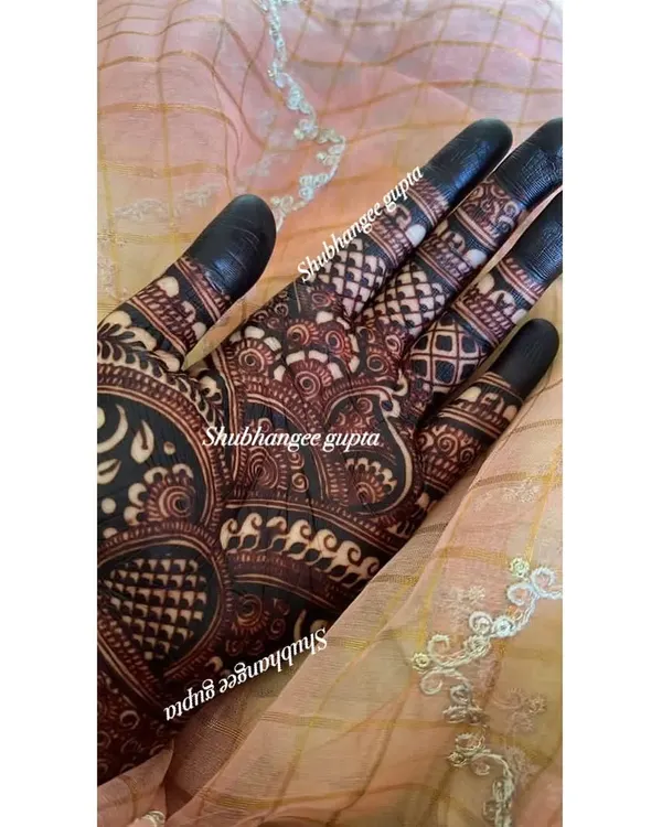 This is the beautiful, dark henna stain you can achieve with my all natural paste and proper aftercare. I teach my clients and students all the secrets to getting the richest color possible.