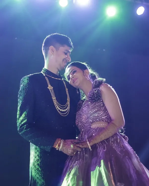 A tender moment between a couple during their Sangeet. I focused on their connection, using the soft stage lighting to create an intimate and romantic atmosphere amidst the celebration.