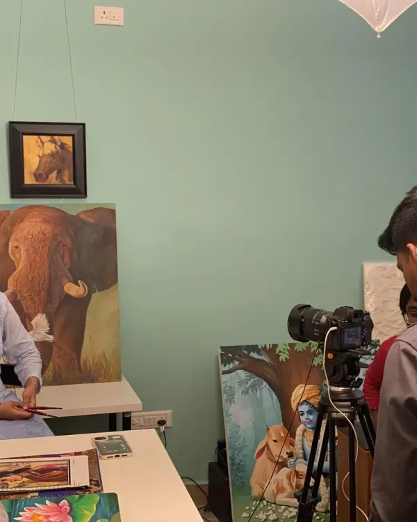 A behind-the-scenes shot of a student profile being filmed in our Malleshwaram studio, surrounded by inspiring artwork.