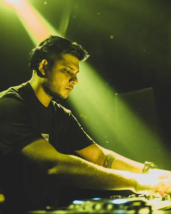 In the zone, focused on the mix. I use professional Pioneer DJ gear to ensure every transition is seamless and the sound quality is perfect for your event.