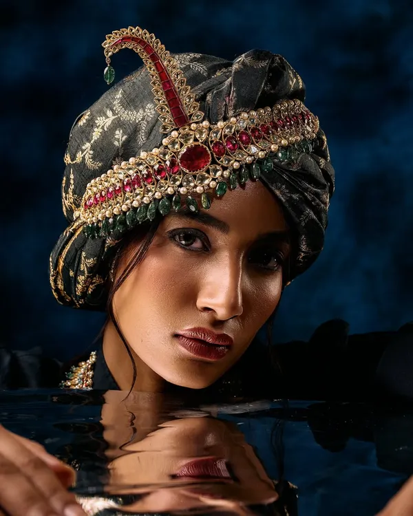 A creative jewellery campaign shot. We used water to add an element of surprise and reflection, making the traditional turban and jewellery feel modern and artistic.