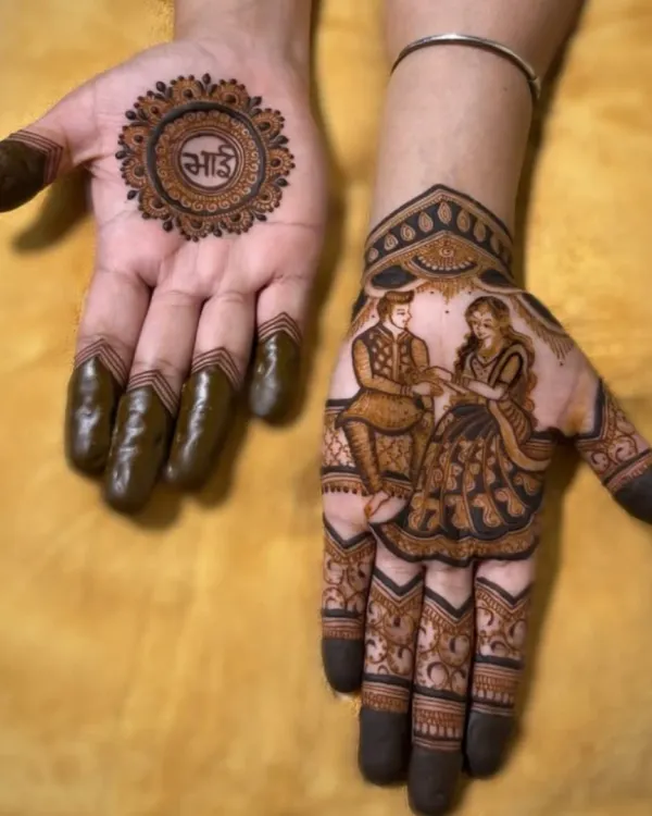 A special design for Raksha Bandhan. One hand features a portrait of a couple, while the other has a mandala with the word "Bhai" (brother) written in the center.
