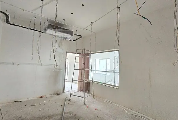 The beginning of a transformation. This is a "before" shot of a bare room in Nellore, ready to be converted into a luxury home cinema.