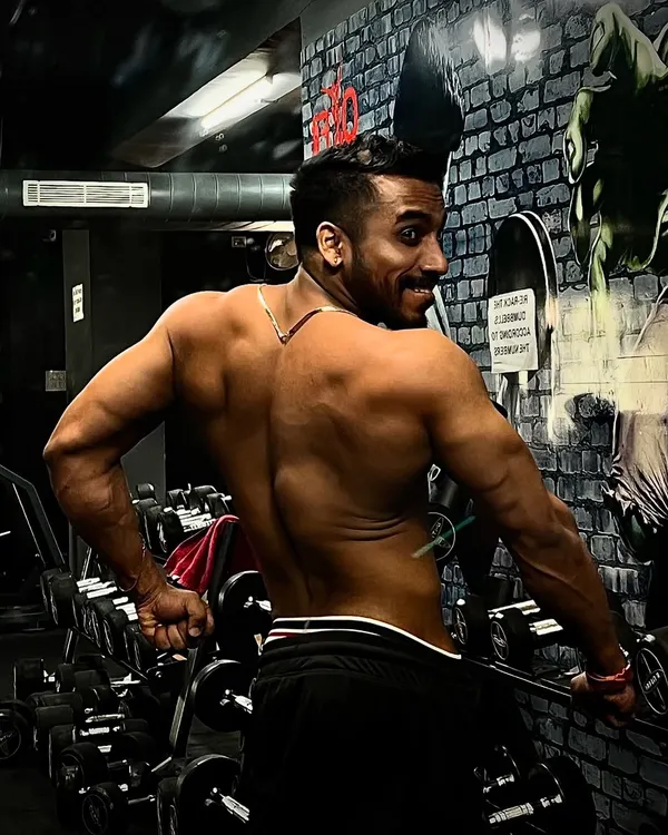 You don't have to be great to start, but you have to start to be great. This back pose shows the results of years of disciplined training.