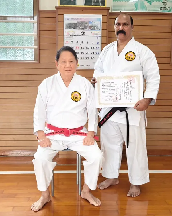 With my teacher, Hanshi Minoru Nakazato, after being awarded the 7th Dan Kyoshi certificate. Receiving this rank in Okinawa, the home of karate, is a responsibility I hold with great respect.
