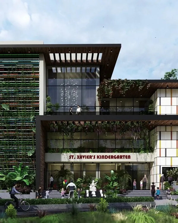 This is the facade I designed for St. Xavier's Kindergarten, a project that blends modern architecture with nature. The prominent green wall and expansive glass surfaces create an environment that is both visually striking and deeply connected to the world outside, fostering a sense of wonder for young learners.