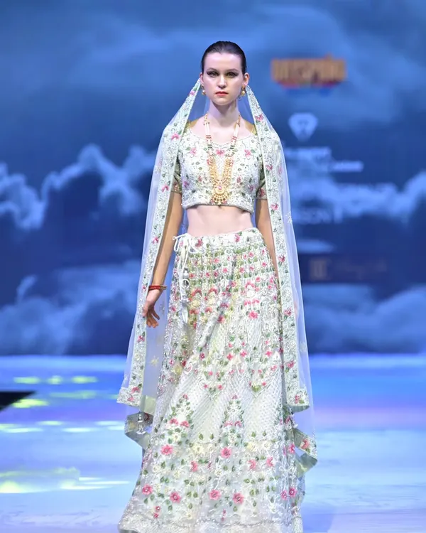 This ivory lehenga from my GULFAM collection is a garden in bloom. The delicate, multi-colored floral embroidery is entirely handcrafted, creating a look that is fresh, modern, and deeply rooted in artistry.