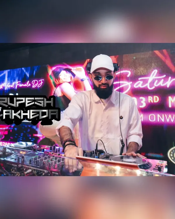 A promotional shot of me at the console, ready for a Saturday night gig. My setup is professional, reliable, and ready for any event, from weddings to clubs.