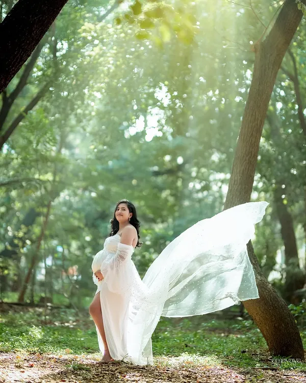 This is what dreams are made of. I love using the golden hour light in nature to create these truly magical portraits. The flowing gown and the sun filtering through the trees make for a timeless memory of this special journey.