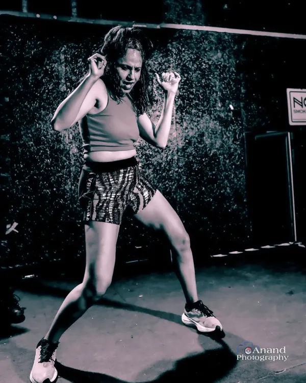 Life is tough, so I train tougher. This shot captures the intensity and passion I bring to every class, whether it's lifting weights or leading a high energy Zumba session.