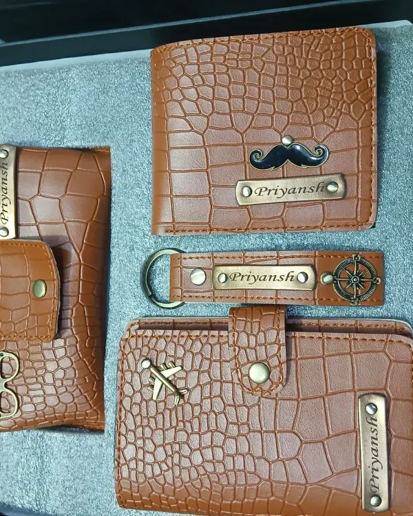 This is one of my favorite gift sets, featuring a matching personalized wallet, passport holder, eyewear case, and keychain, all in a stylish brown crocodile-textured leather. Each piece is customized with a name and a unique charm, making it a complete and luxurious gift for any occasion.