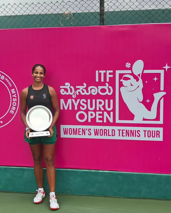 Celebrating a significant victory on the international stage. Our player Riya Bhatia proudly holds the doubles championship trophy at the ITF W15 Mysuru Open, a key milestone on the Women's World Tennis Tour.
