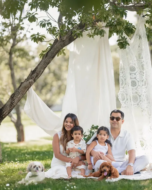 This is what it's all about. A beautiful family, their sweet children, and even their furry friends, all enjoying a perfect day under the trees. I love creating these relaxed, joyful outdoor family portraits that you'll treasure forever.