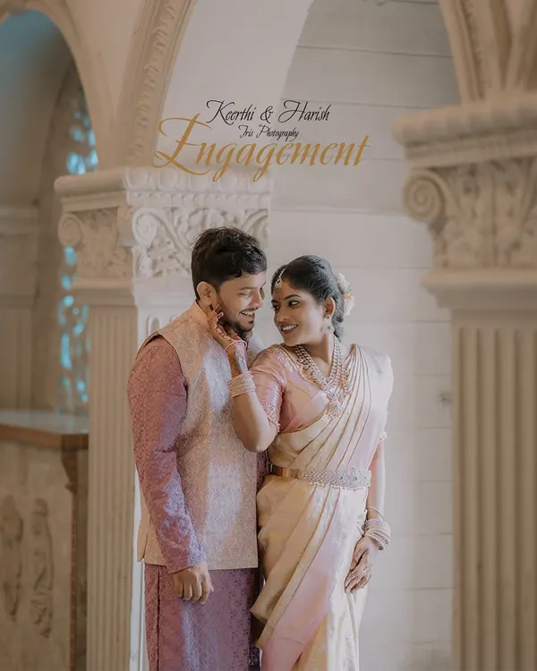A playful, happy moment between an engaged couple. Her hand on his cheek and their shared smiles show the easy chemistry that makes for a great engagement photo.