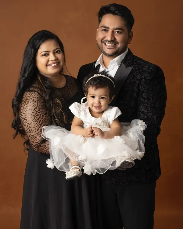 A beautiful family portrait, with their little star shining brightly. I love creating these classic, elegant images that freeze a moment of pure happiness and love.
