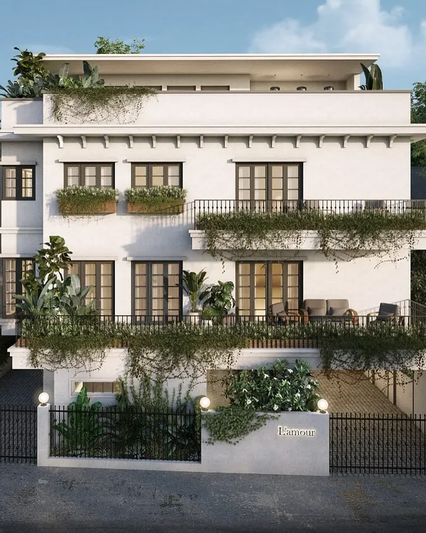 The exterior facade of the L'amour bungalow project. My goal was to create an elegant and inviting first impression, using classic architectural elements, wrought-iron railings, and integrated greenery to hint at the refined interiors within.
