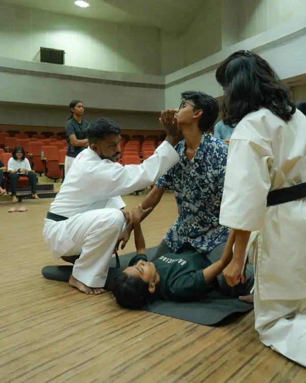 We teach you how to handle situations where you are outnumbered or on the ground. This drill simulates a multi-person threat, focusing on ground defense, creating space, and getting back to your feet.