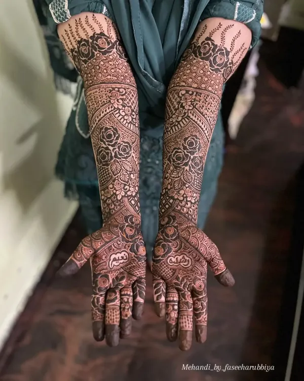 This is the level of detail and dedication I bring to every bride. This full bridal mehendi features a dense combination of floral, paisley, and traditional Indian patterns, covering the arms from fingertips to elbow for a truly stunning result.