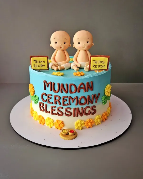 No hair, don't care! A special chocolate truffle cake for the Mundan ceremony of twin boys, Tejan and Tejas. The cake features cute, bald baby figurines and traditional elements.