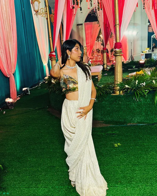 I designed and created this entire outfit, from the custom-draped saree to the sparkling sequin blouse. This look is perfect for a wedding guest or for a bride's reception. I love working on custom designs that make you feel one-of-a-kind.