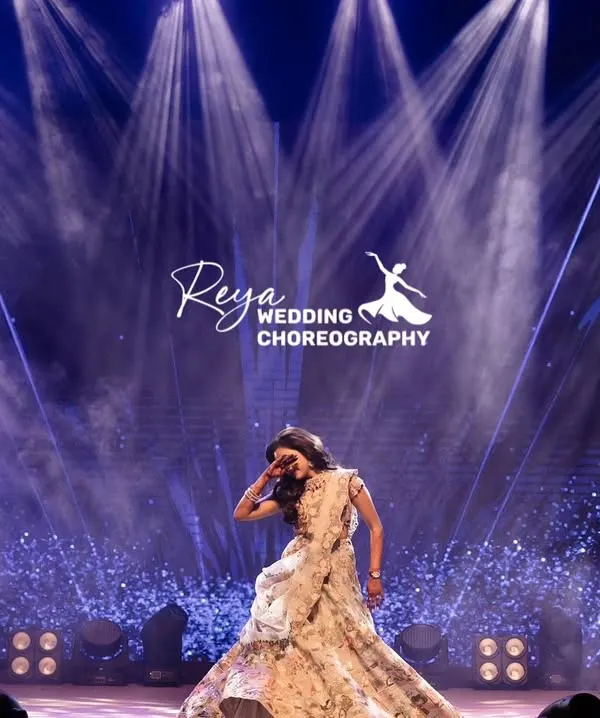 Posture and grace. This shot captures the elegance and poise of a bride's solo. It's all in the details, from the hand gestures to the confident expression.