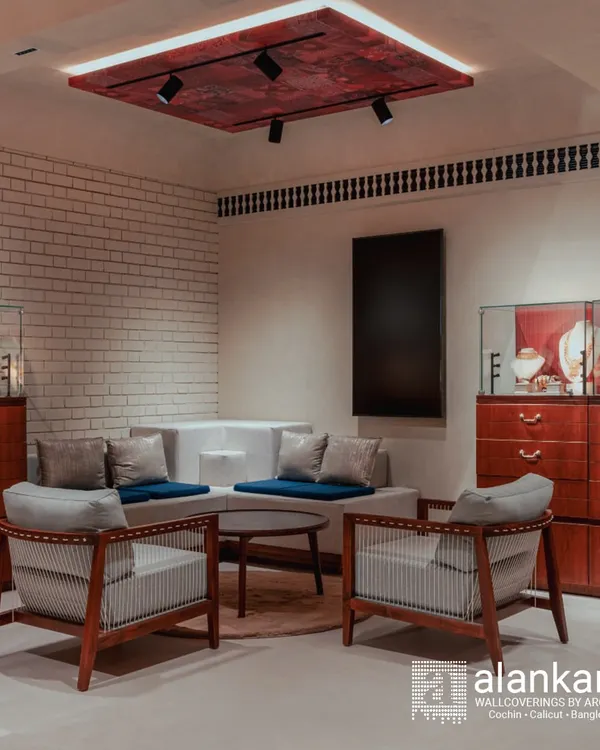 A complete interior solution for a high-end commercial client. We designed and installed the seating, display cabinets, and even the textured ceiling panel to create a cohesive and luxurious brand experience.