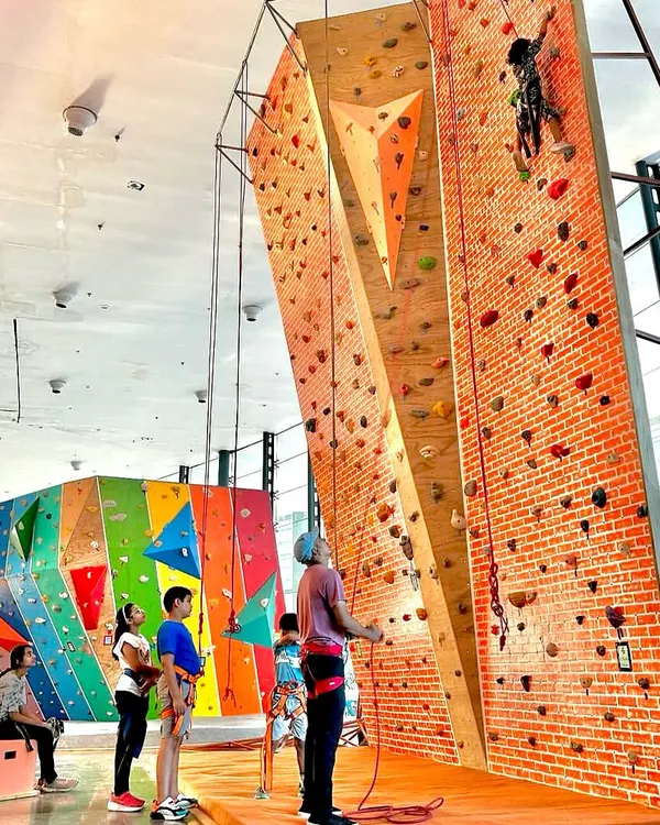 Welcome to Delhi Rock. Here, climbers of all ages can reach new heights on our tall top-rope walls. We love seeing the focus and determination as kids and adults alike tackle our unique brick-faced climbing routes with the full support of our coaches and community.