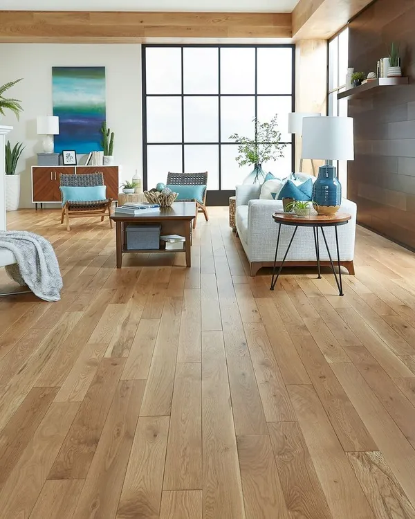 This is my go-to look for a modern, sun-filled living room. The wide planks of light, natural wood flooring amplify the natural light and create an atmosphere that is both expansive and inviting.