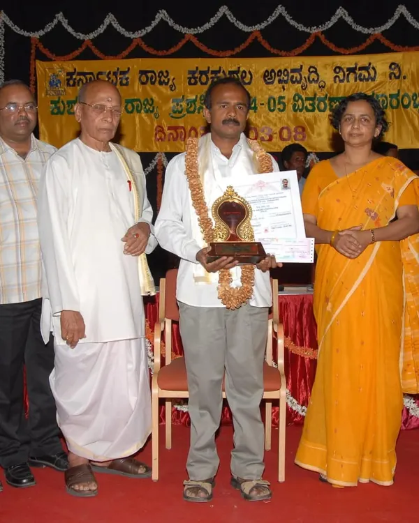 A proud moment, being honored with the Karnataka State Award for Mysore paintings in 2003-2004. This recognition fuels my passion to continue preserving and teaching this beautiful art form.