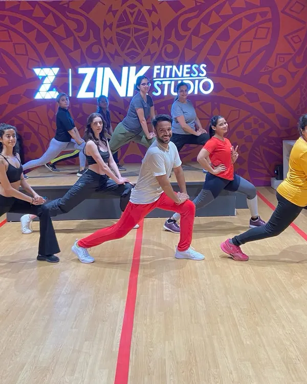 A great stretching session together after a tough workout. A good workout always leaves you with a beautiful smile and a feeling of satisfaction.