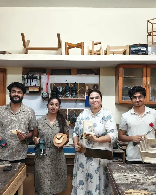 Look at these smiles. This is what a typical weekend at the workshop looks like. People from all walks of life, most with zero prior experience, holding something they built with their own hands. We made everything from clocks to small tables this day.