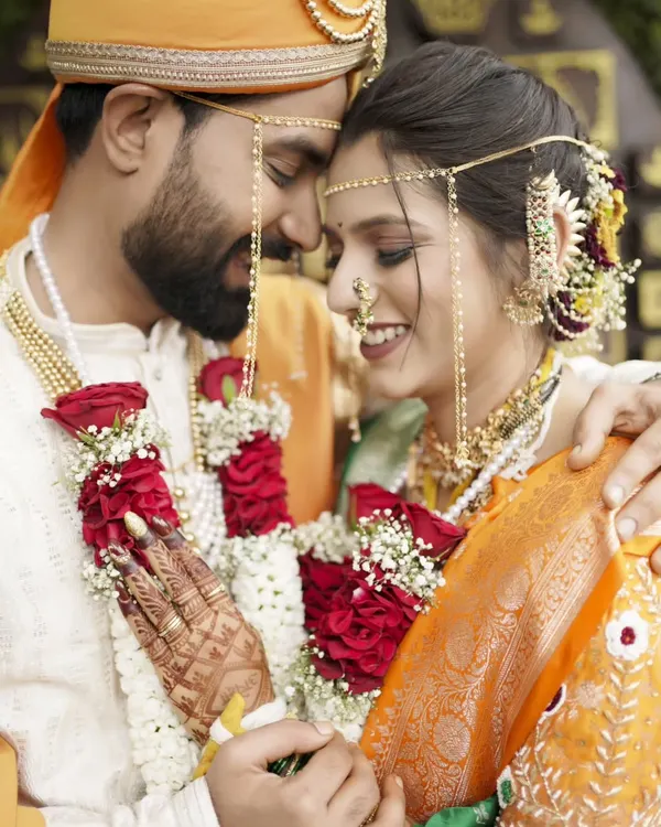 A beautiful close-up, capturing the intimacy and affection between the newly married couple.