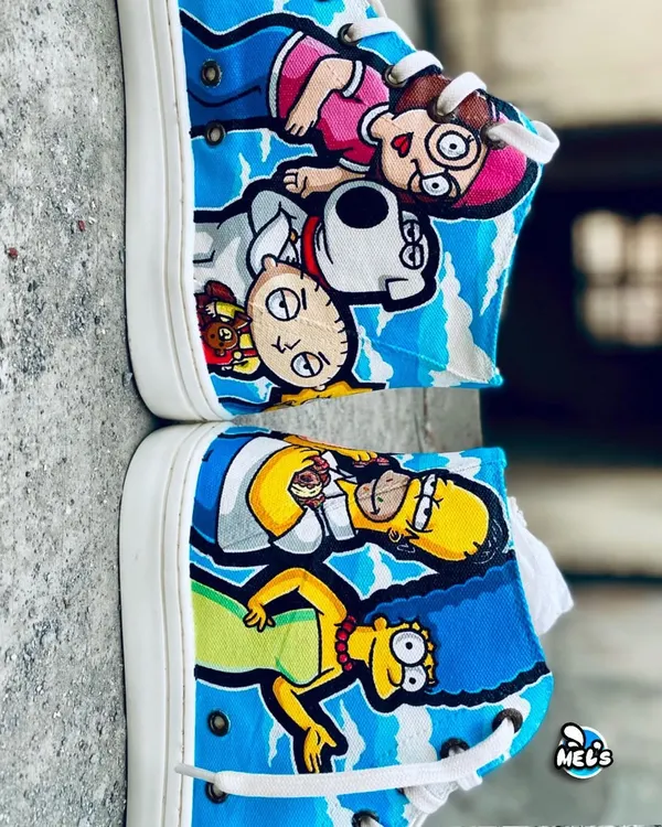 An ultimate cartoon crossover on a pair of Levi's high-tops. One shoe features Homer and Marge Simpson, while the other has the Griffin family, including Peter, Lois, Stewie, and Brian.