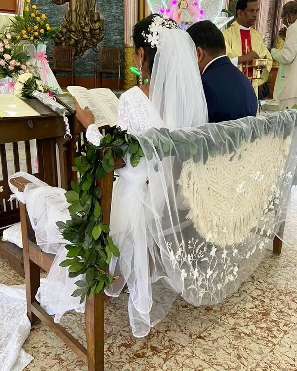 My macrame decor in action at a beautiful wedding ceremony. The large piece was used to decorate the couple's kneeler at the altar.