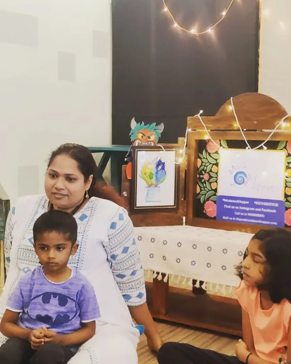 A quiet moment before the 'Nautical Narratives' workshop begins. You can see my Kamishibai stage set up with artwork and props, ready to transport the children to a world of sailors and sea adventures.