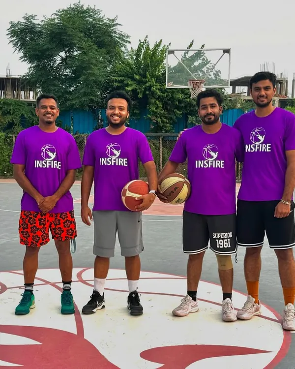 Meet the Insfire team. A group of our coaches standing together on the court, ready to lead the next generation of players.