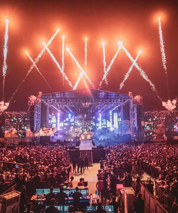 Commanding the stage at a sold out concert, opening for the legendary Harris Jayaraj. This is the kind of large scale, high production value event I specialize in, complete with massive crowds, an incredible light show, and pyrotechnics.