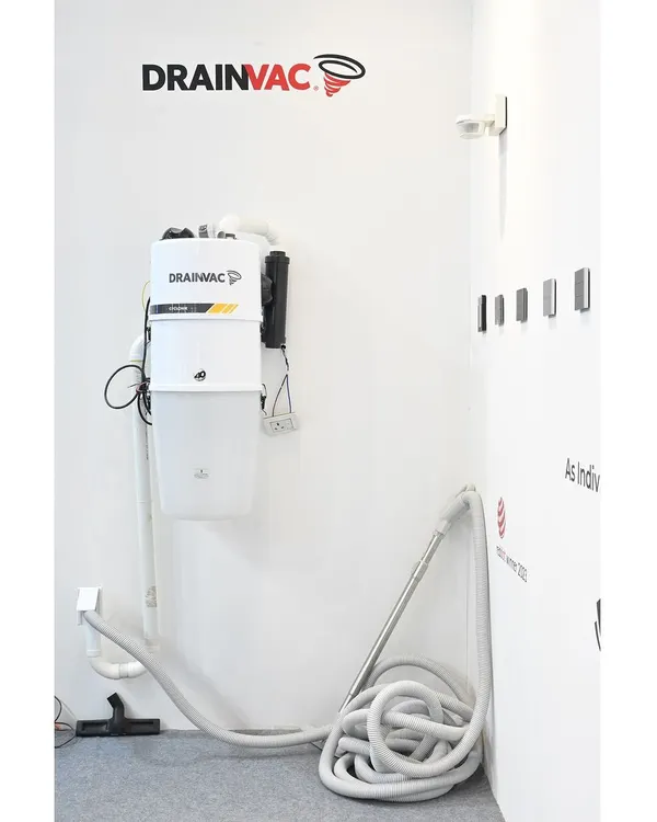 This is our Drainvac central vacuum unit, a key component of our home wellness solutions. By venting dust and allergens completely outside the home, it drastically improves indoor air quality and is an essential system for families concerned with allergies and respiratory health.