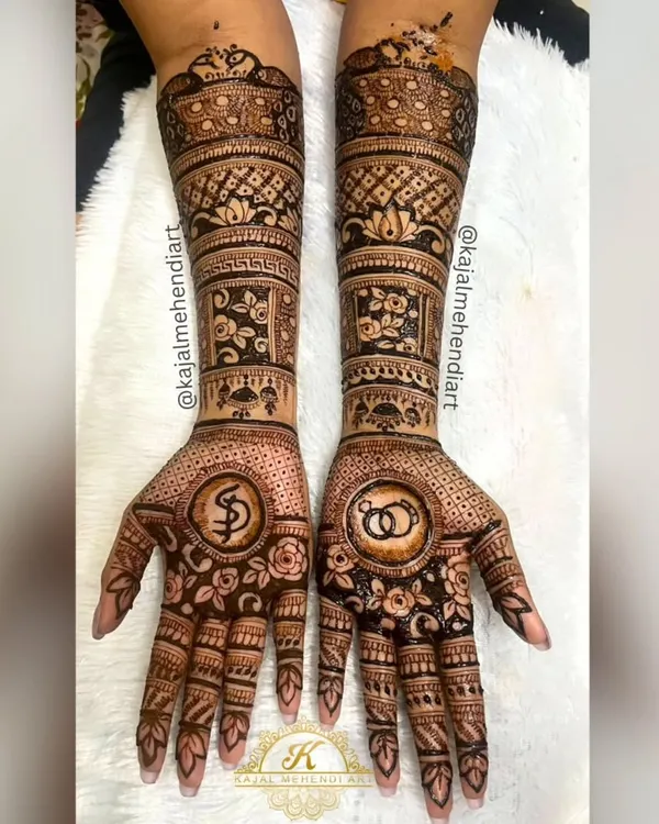 A special design for a beautiful bride-to-be on her engagement. I included the couple's initials and interlocking rings on the palms to symbolize their union.
