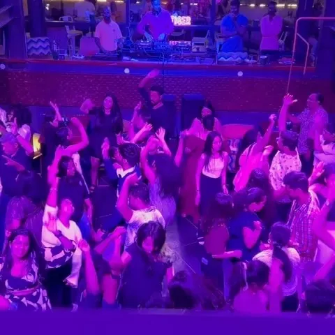 This is the energy I bring to every event. A packed dance floor, hands in the air, and non-stop music is my promise. This shot from Big Pitcher Sarjapur shows a typical high-energy Bollywood night with me on the decks.