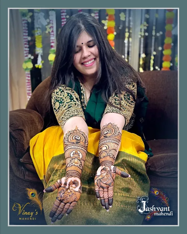 The beautiful bride Ujala, all smiles as she shows off her full bridal mehndi. Her happiness is what makes our work so fulfilling.