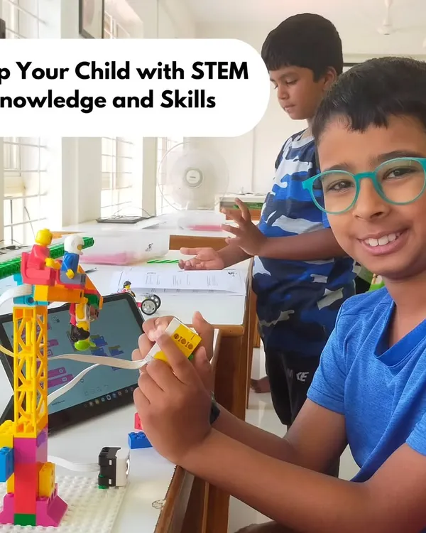 This image captures the joy and focus that our hands-on STEM programs inspire. We equip your child with essential skills in a fun, creative environment, turning curiosity into tangible knowledge by building projects like this LEGO crane.