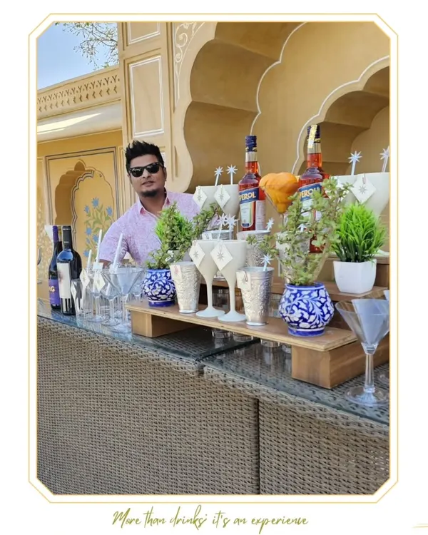 A stylish bar setup for a brunch event, showcasing our creative use of glassware and fresh garnishes.