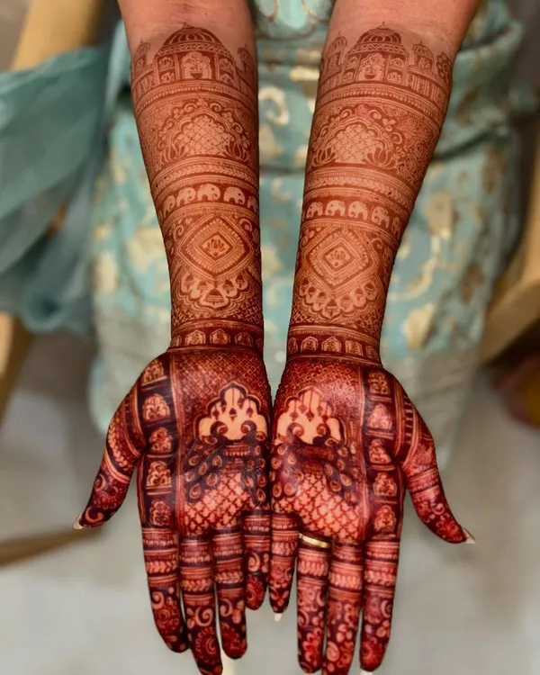 This is the fresh, deep red stain that develops from my natural henna paste. The color is rich and even across the intricate design.
