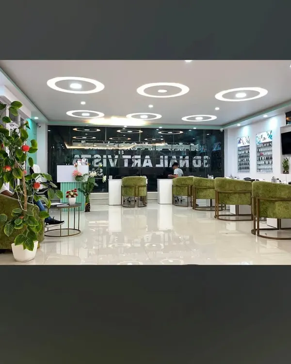 A wide view of our spacious and modern Yelahanka branch, featuring clean white floors, comfortable seating, and bright lighting.
