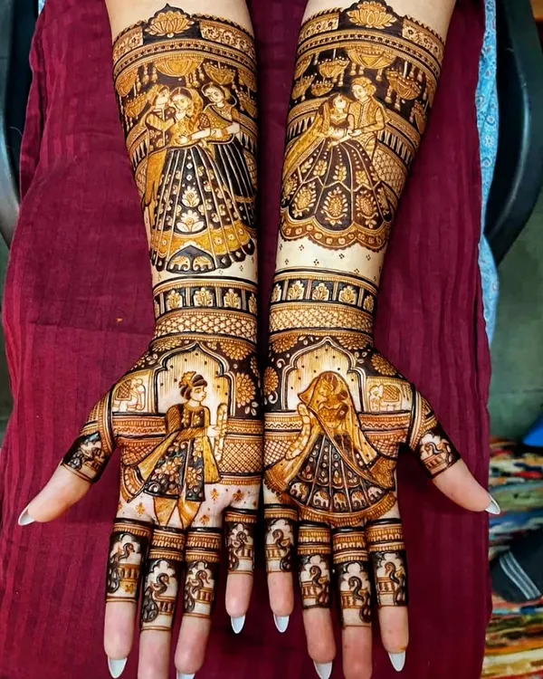 This is my specialty, telling your story through henna. This full-arm bridal mehendi features detailed portraits of the bride and groom during the varmala ceremony, capturing a key moment of the wedding.