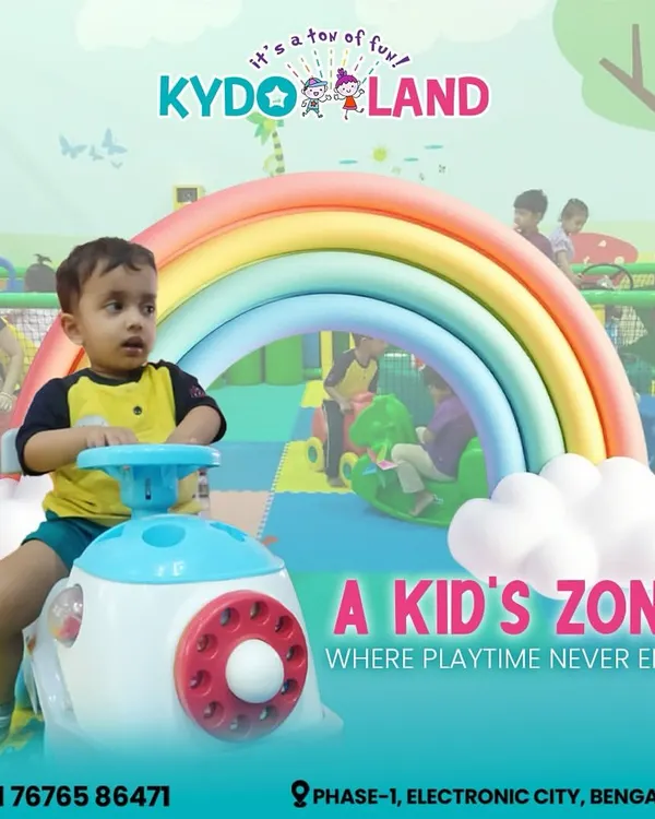 Our dedicated kid's zone where playtime never ends. This little one is enjoying a ride on one of our popular toddler-friendly toys.