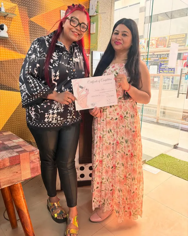 Another happy student receiving her professional nail art certification. My goal is to empower you to start your own business, and this is the first step.