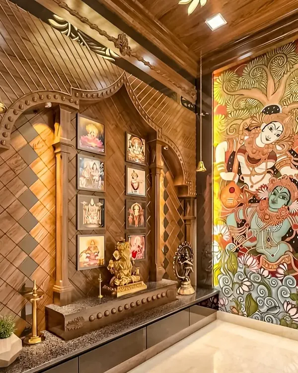 A breathtaking, traditional pooja room with intricate wood carving and a stunning mural of Radha and Krishna. This space is a true testament to artistry and devotion.