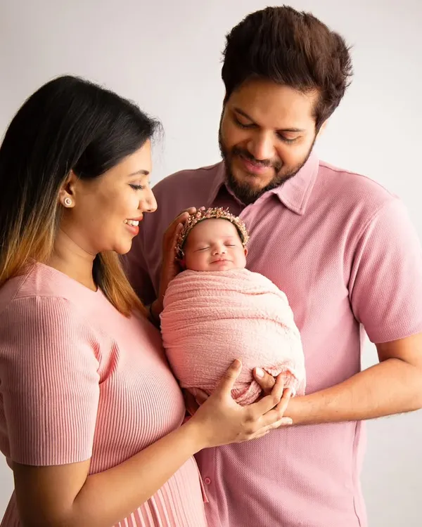 The love in a family's eyes as they hold their new baby is pure magic. We took a moment during this session for a beautiful family portrait, with everyone glowing.